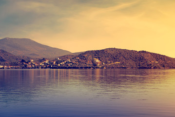 View from the deck of cruise ship on the coast of the gulf Pagas