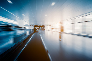 blurred motion of airport moving walkway,shanghai,china.