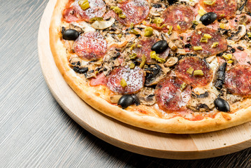 pizza on the wood background