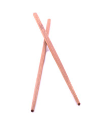 Wooden pairs of chopsticks on white background