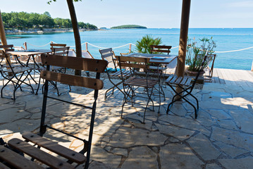 Chairs and tables with beautiful sea view