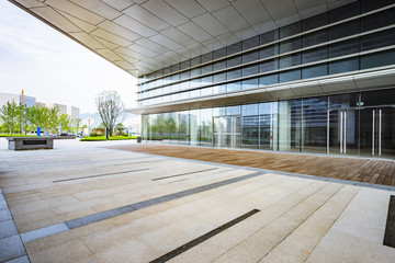 office building entrance with empty brick road,china.