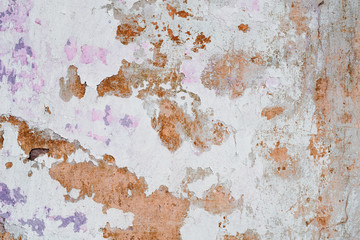 Wall fragment with scratches and cracks