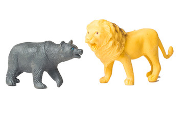 Toy lion and toy of black bear isolated white
