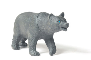 rubber(plastic) toy of black bear isolated white