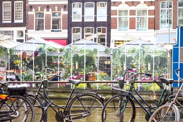 Papier Peint photo Fleuriste Flower market in Amsterdam (Bloemenmarkt) and bicycles