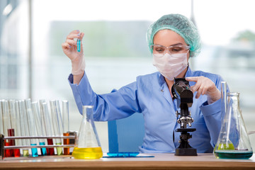 Woman chemist working in the lab