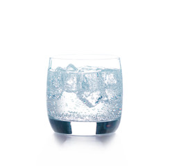 Glass of pure water with ice cubes