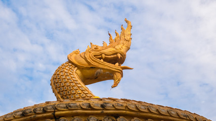 Fototapeta na wymiar King of Nagas with blue sky background
