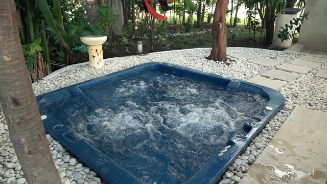 View of jacuzzi in garden, super slow motion 240fps
