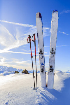Ski in winter season, mountains and ski touring equipments on th