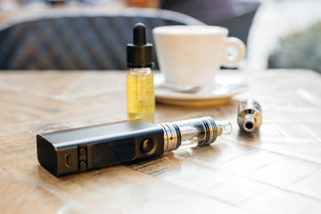Vape or electronic cigarette on the table