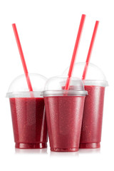 Raspberry and strawberry smoothie in three size of plastic cup