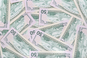 American dollar banknotes laid out evenly. Financial background