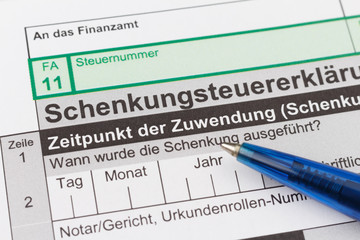 Accessions tax, gift tax form according german law with blue pen