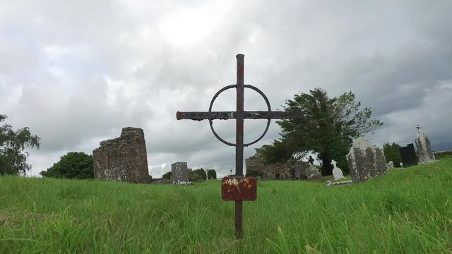 old grave cross on celtic cemetery in ireland 66