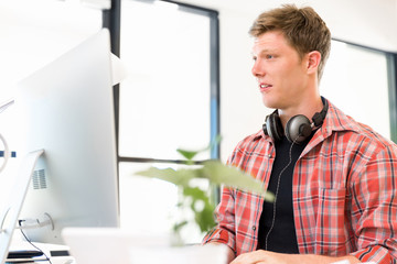 Young man working in office