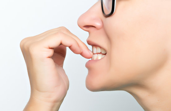 Woman Biting Nails