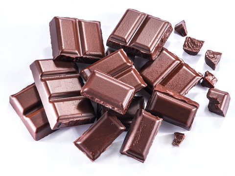 Pieces of chocolate bar isolated on a white background.