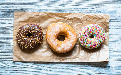 Colorful Donuts breakfast composition with different color styles