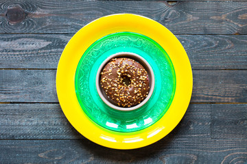 Colorful Donuts breakfast composition with different color styles
