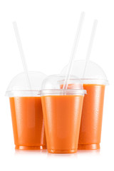 Carot juice in three size of cups - obrazy, fototapety, plakaty