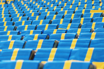 Fototapeta premium Abstract view of the chairs at a Stadium with swedish flags