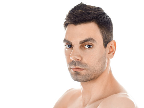 Closeup portrait of handsome man with healthy clean skin isolate
