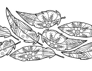 Seamless background with ornate bird feathers