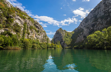 Fototapeta na wymiar View of Cetina river around Omis (Almissa) city, Dalmatia, Croatia/ canyons/river/green/mountains