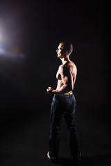 Fototapeta na wymiar Rear view of healthy muscular young man