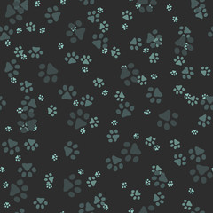 Animal paws. Random sized footprints. Seamless pattern. Vector illustration