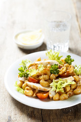 Grilled chicken and pasta salad with red pesto