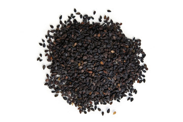 Pile of black sesame seeds isolated on white background