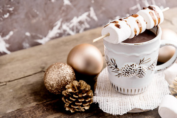 Hot chocolate with marshmallow and christmas ornaments 