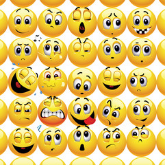 Smileys with different face expression stuck with each other in a group.