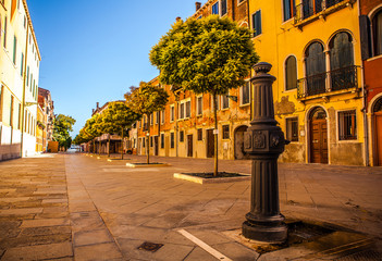 VENICE, ITALY - AUGUST 20, 2016: Famous architectural monuments and colorful facades of old medieval buildings close-up on August 20, 2016 in Venice, Italy.