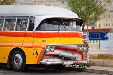 Vintage maltese buses used as a traveling shop © arkanto