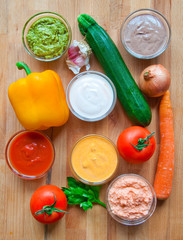 Assorted sauces on wood