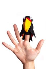Puppet toucan isolated on white background.