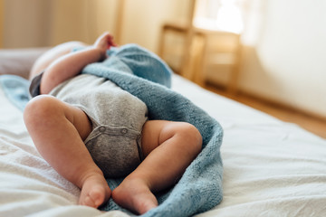 Legs of lying baby