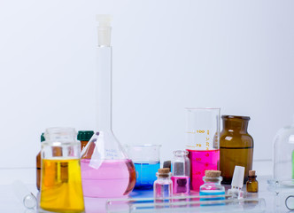 Laboratory test tubes and flasks with colored liquids