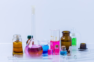 Laboratory test tubes and flasks with colored liquids