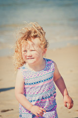 Smiling girl at the beach