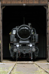Old Vintage Steam Locomotives At The Train Depot
