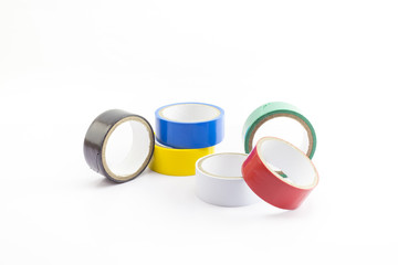 Multicolored adhesive insulating tapes roll isolated on white background.