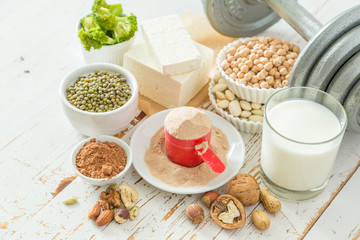 Selection vegan protein sources on wood background