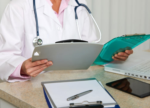 Doctor woman working in clinic.