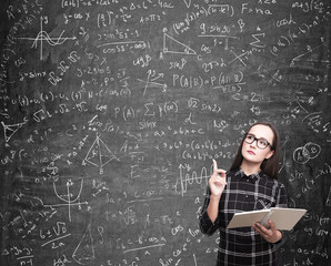 Nerd girl solving a difficult problem