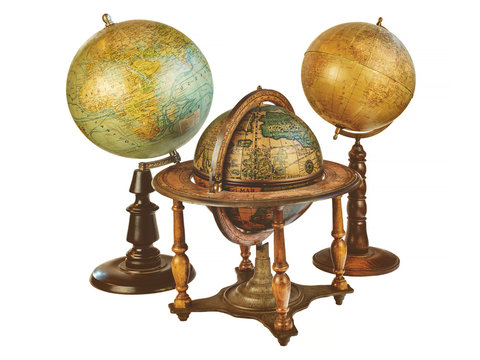 Three ancient world globes isolated on white